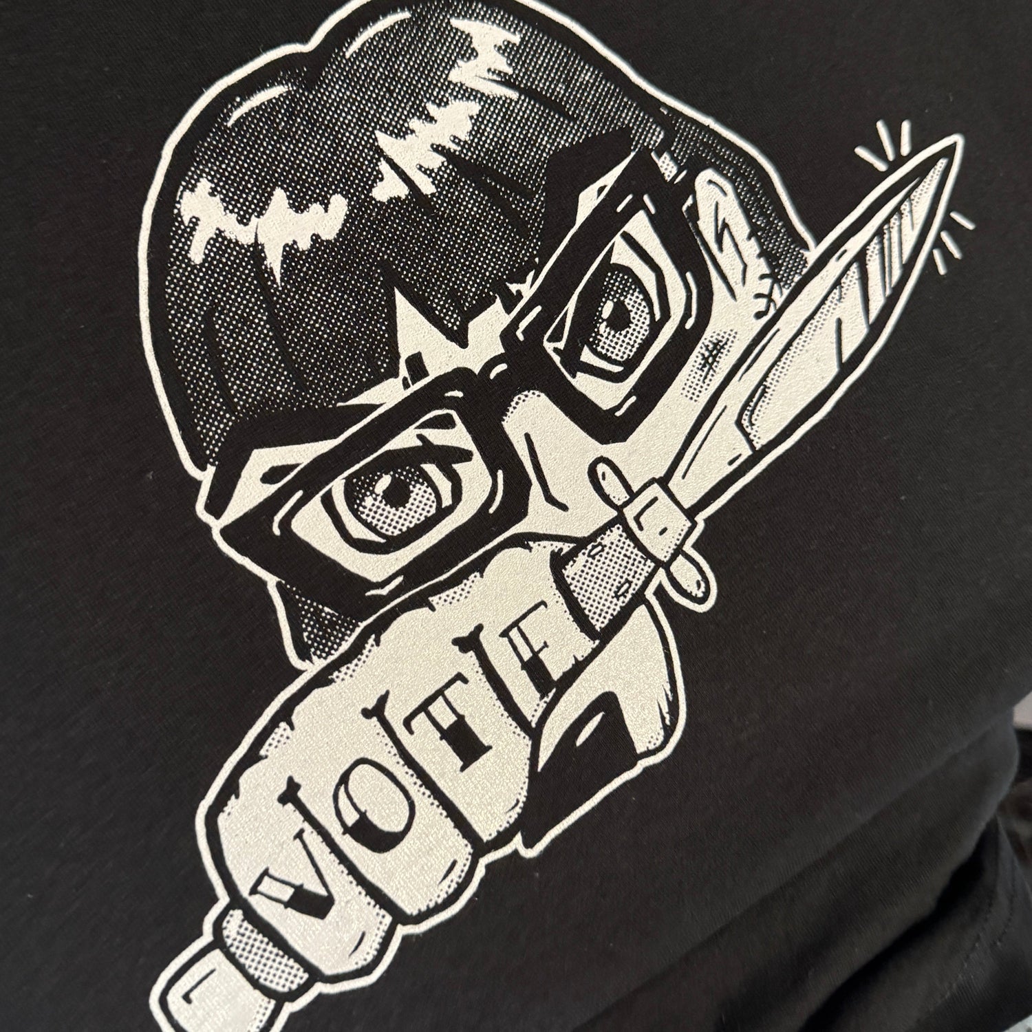 black t-shirt with an anime girl VOTE print