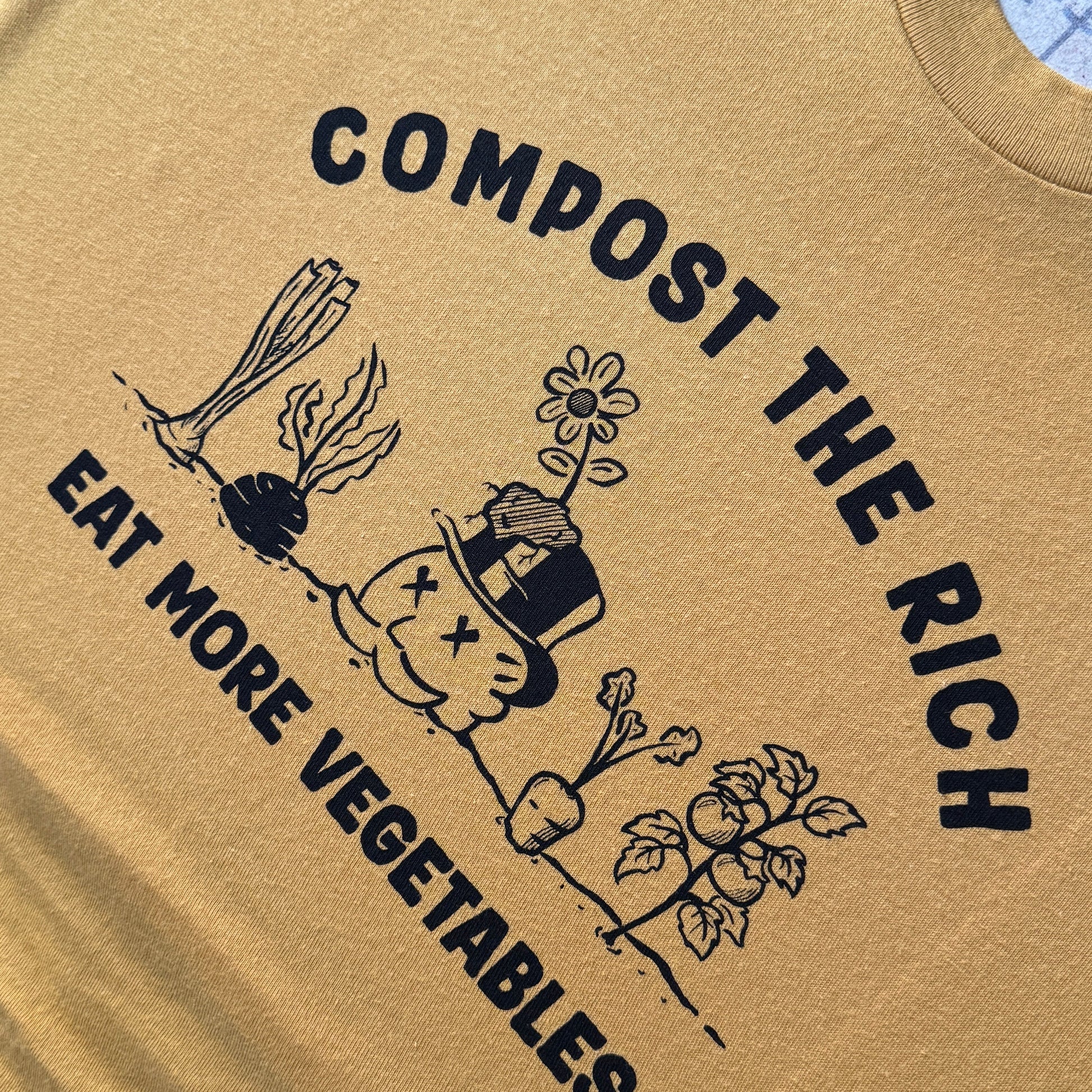 t-shirt with COMPOST THE RICH and EAT MORE VEGETABLES with drawn graphics